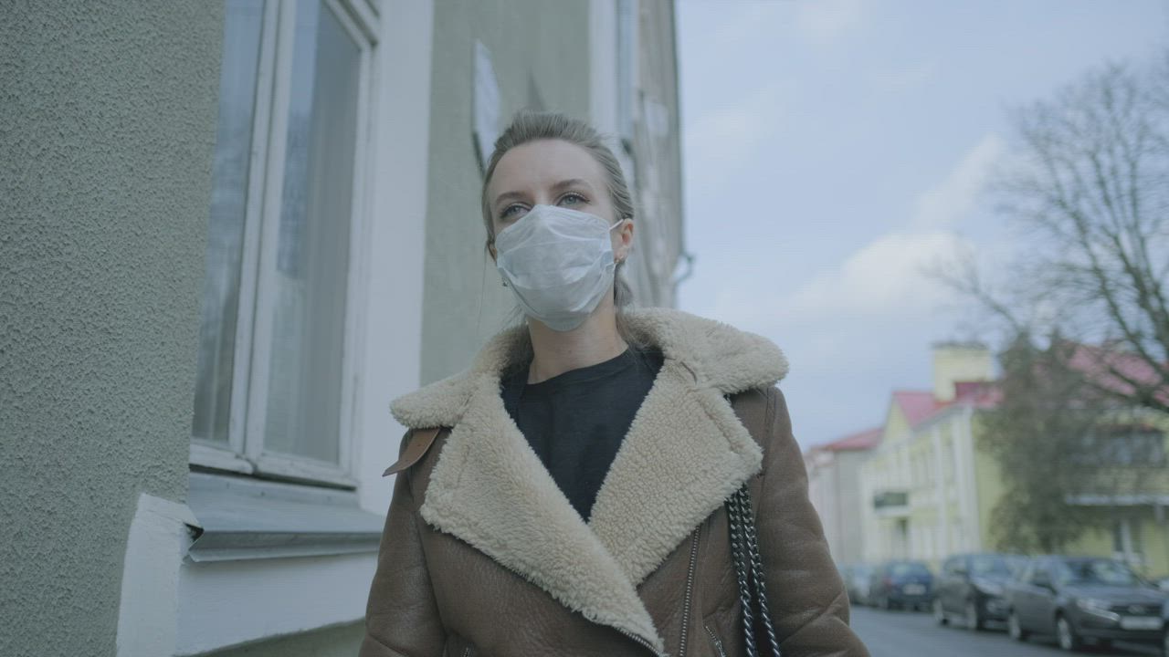 Woman walking in street - Free Stock Video