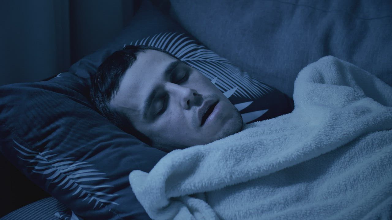 Man deep asleep with his mouth open - Free Stock Video