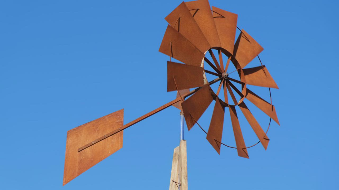 Rusty old windmill still working - Free Stock Video