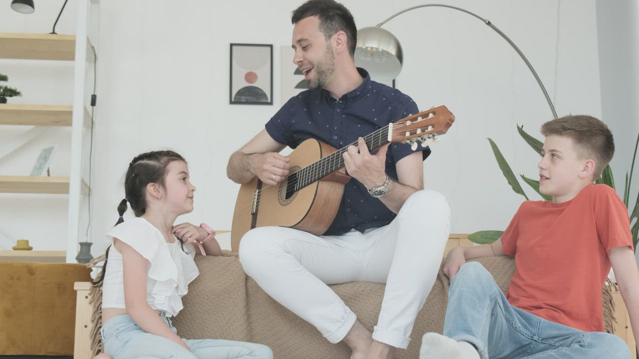 Dad sharing time with his children - Free Stock Video