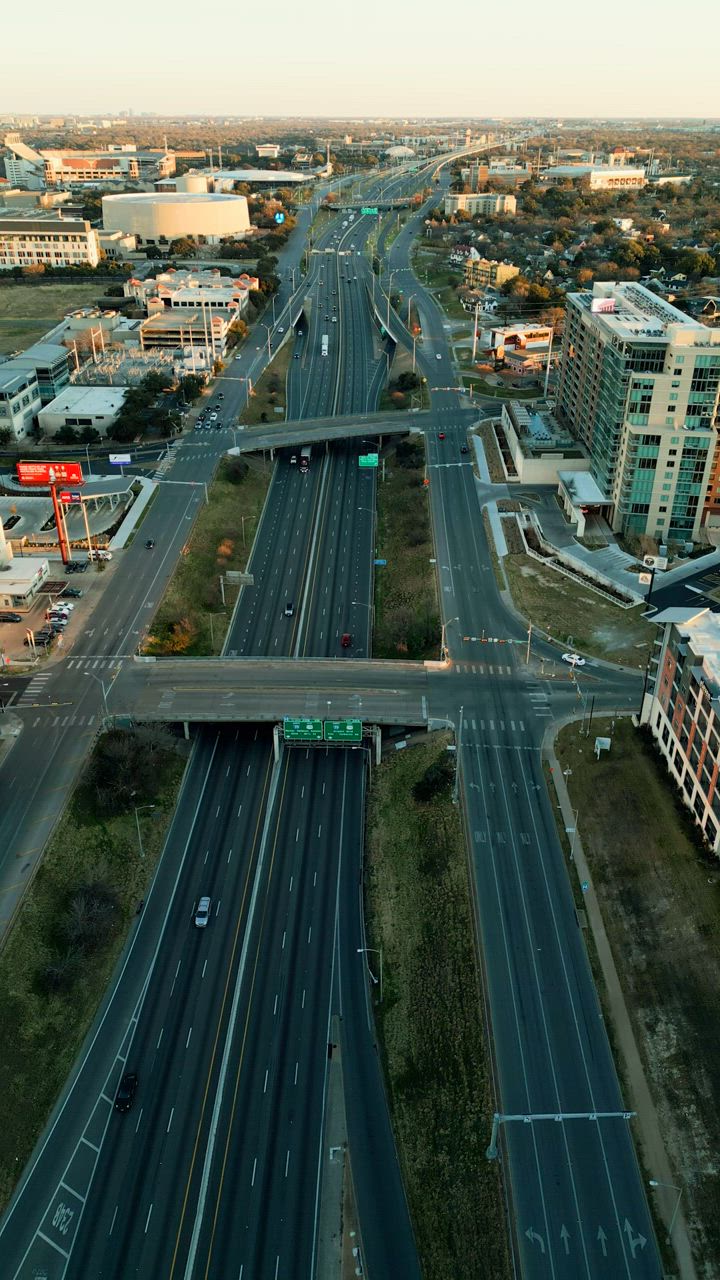 Highway and roads of a city in an aerial view - Free Stock Video