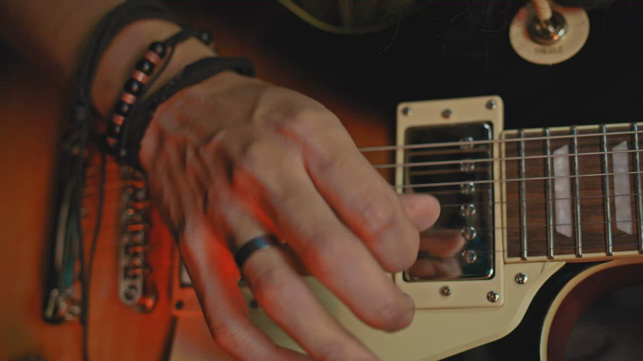Talented Guitarist's Close-Up Solo on Les Paul - Free Stock Video