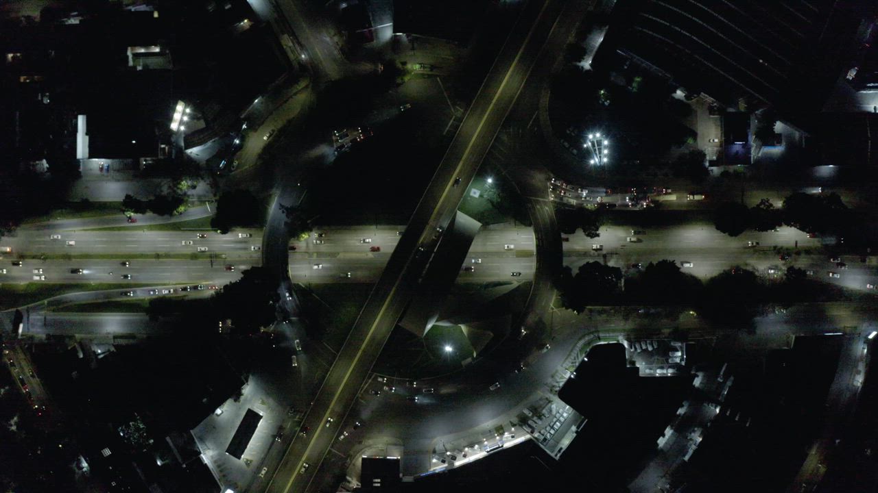 Aerial shot of traffic near a roundabout - Free Stock Video