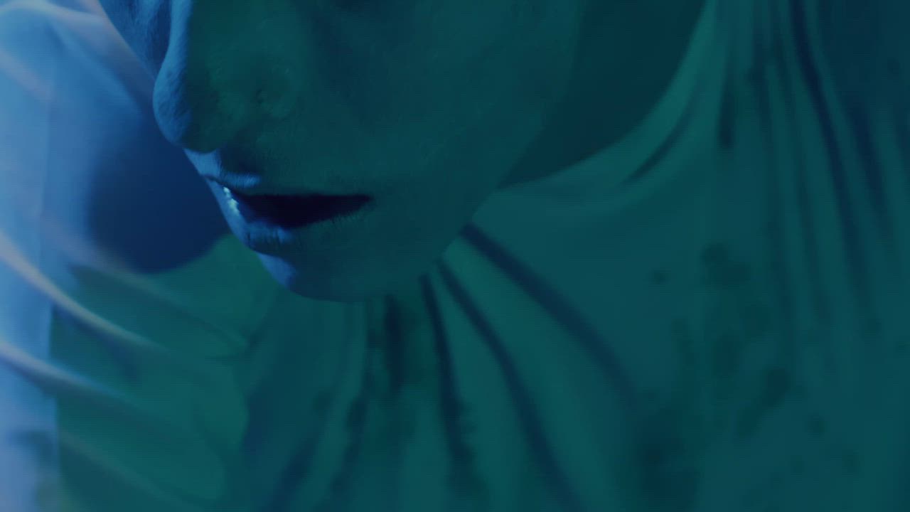 An eerie-looking alien looks confused and helpless in the middle of the ...