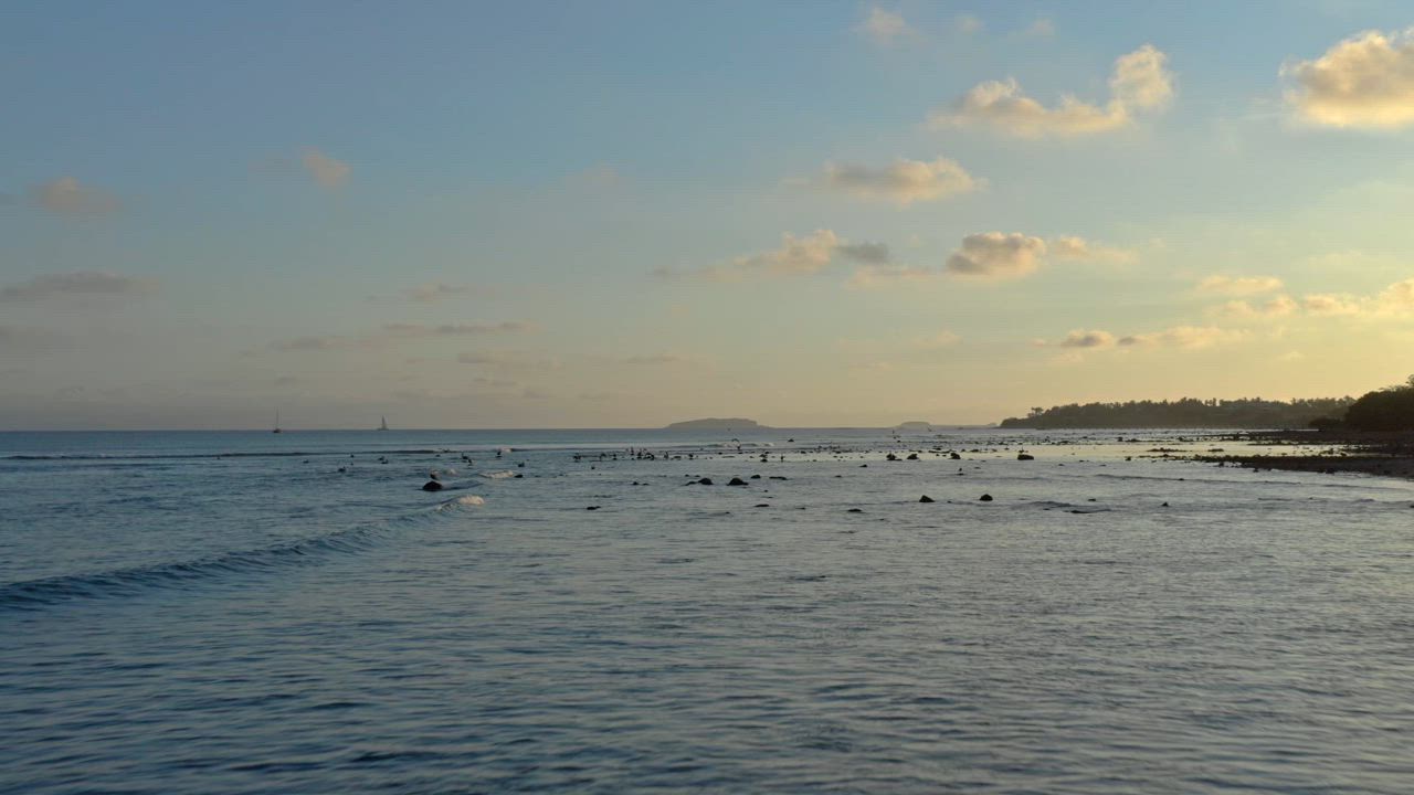 Sea shore full of rocks and waves - Free Stock Video