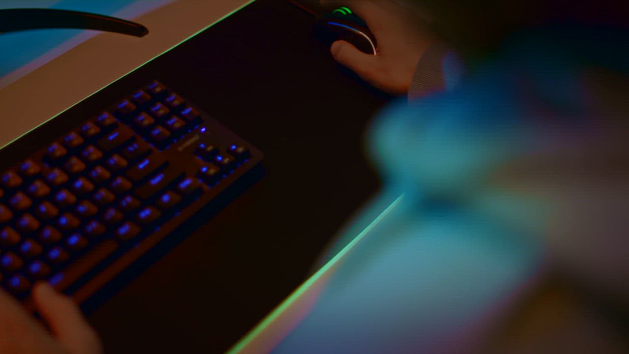 A young man gaming constantly pressing the backlit keyboard - Free ...