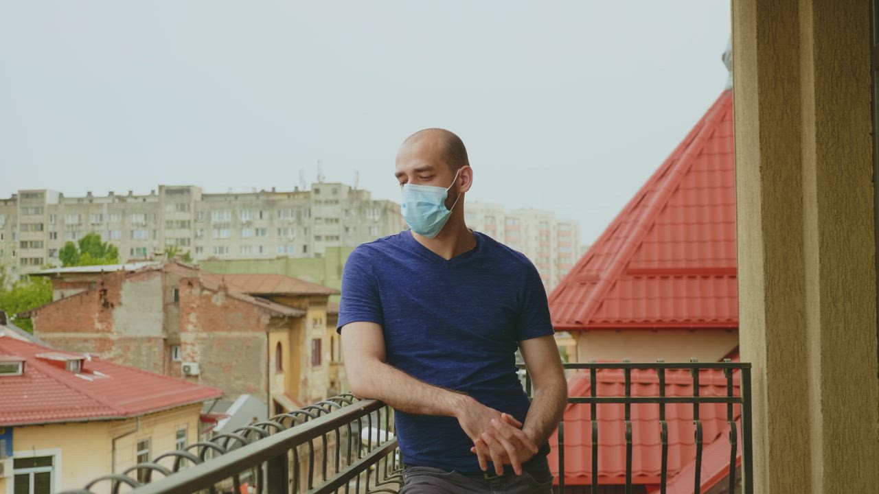 Man isolating at home during a pandemic - Free Stock Video