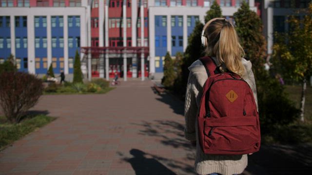 Girl walking to school.
