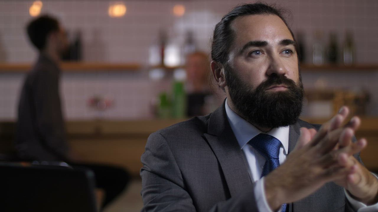 Businessman smiling at the camera - Free Stock Video