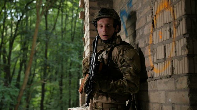 Soldier moving into an area.