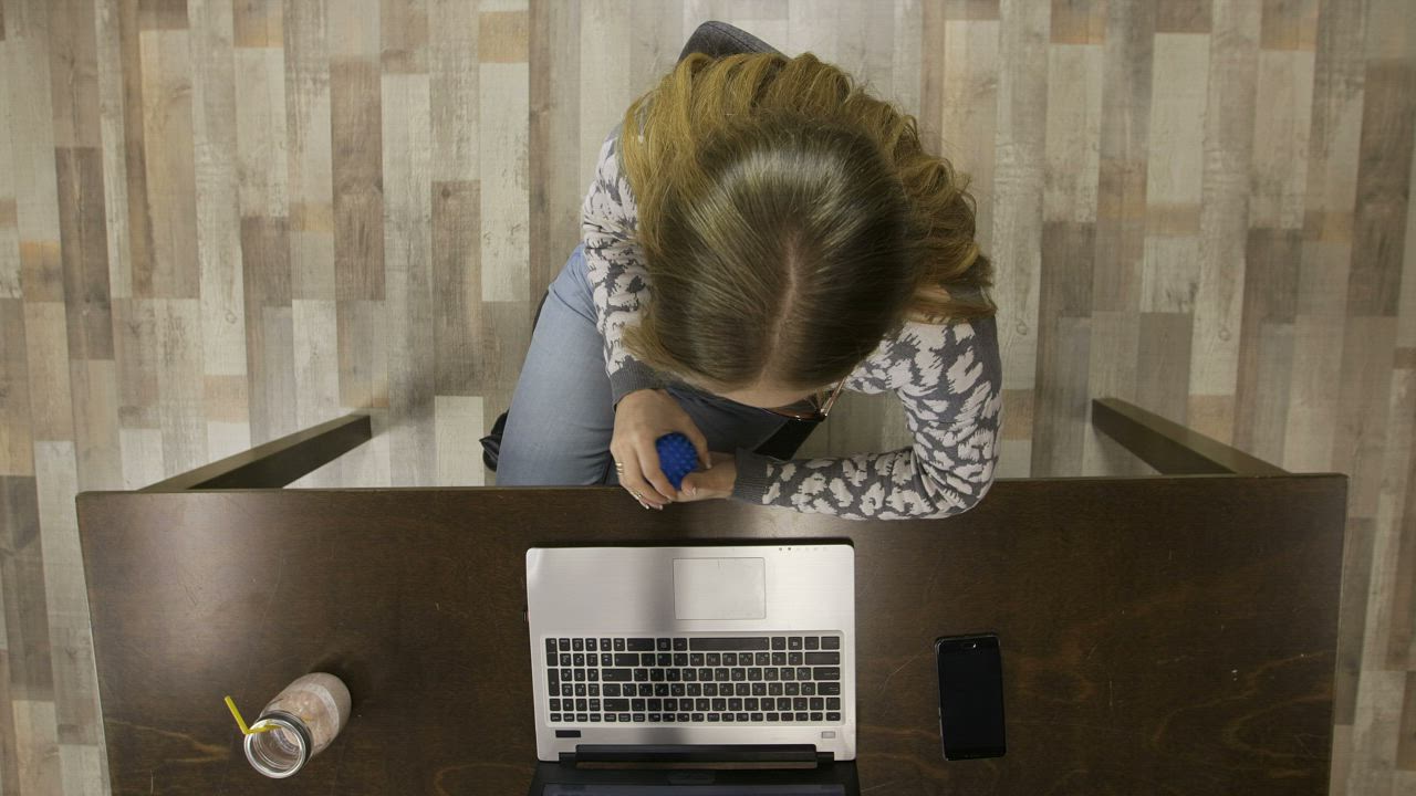 Stressed woman working slowly - Free Stock Video