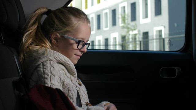 Girl arriving for school.