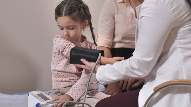 Patient having their blood pressure measured.