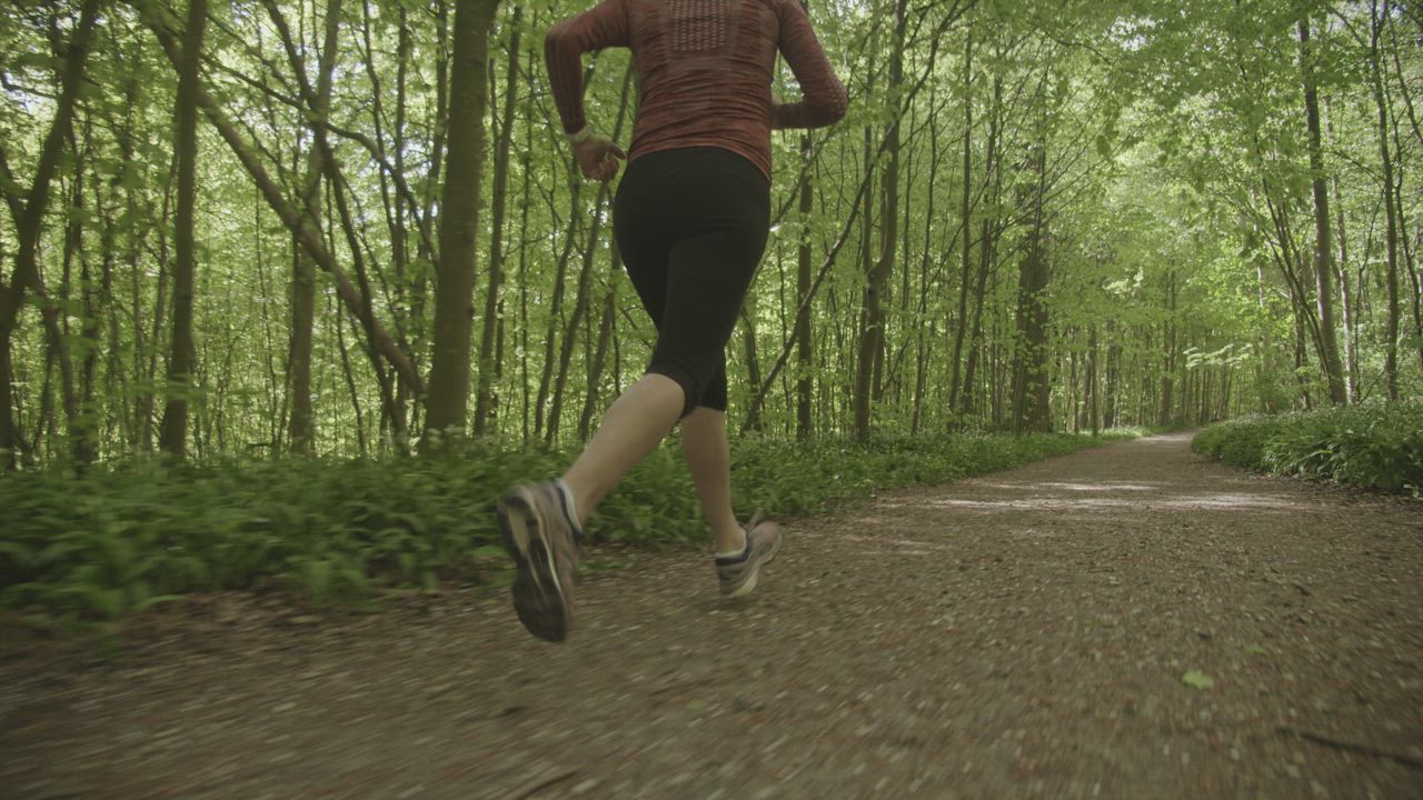 Woman out for a run - Free Stock Video