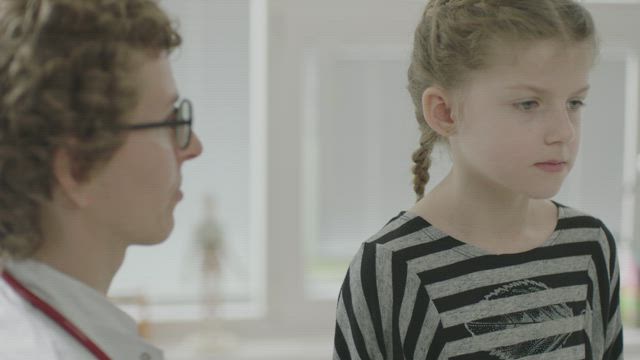 Doctor examining a patient.