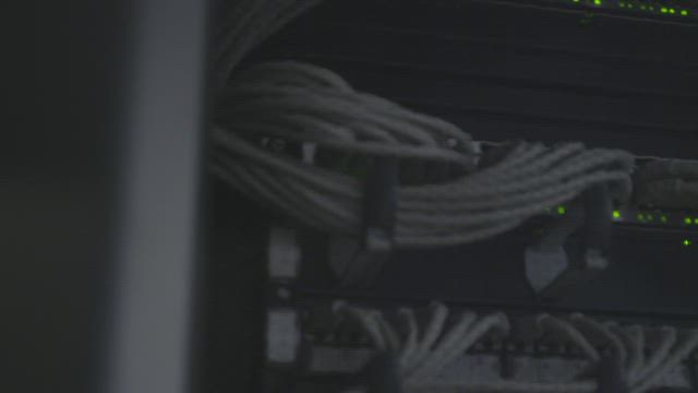 Tidy cables in a server rack.
