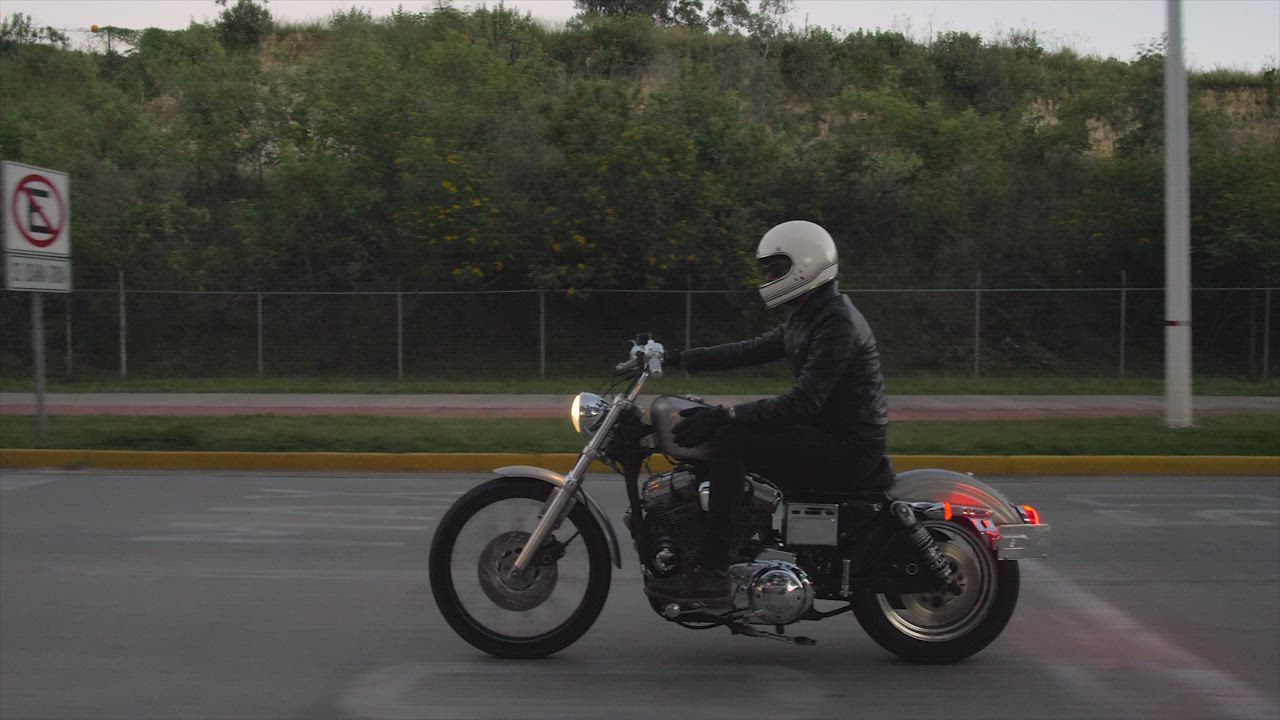 Biker driving on a highway - Free Stock Video