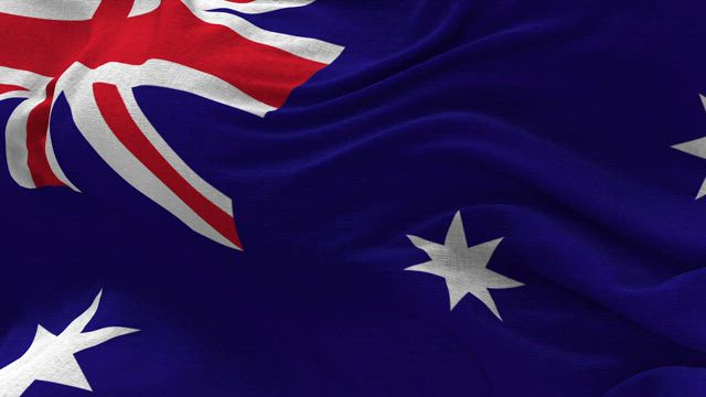 Australian flag waving gently in closeup.