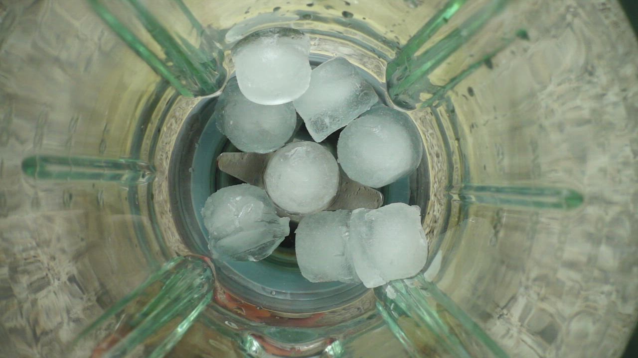 Grinding ice in the blender - Free Stock Video
