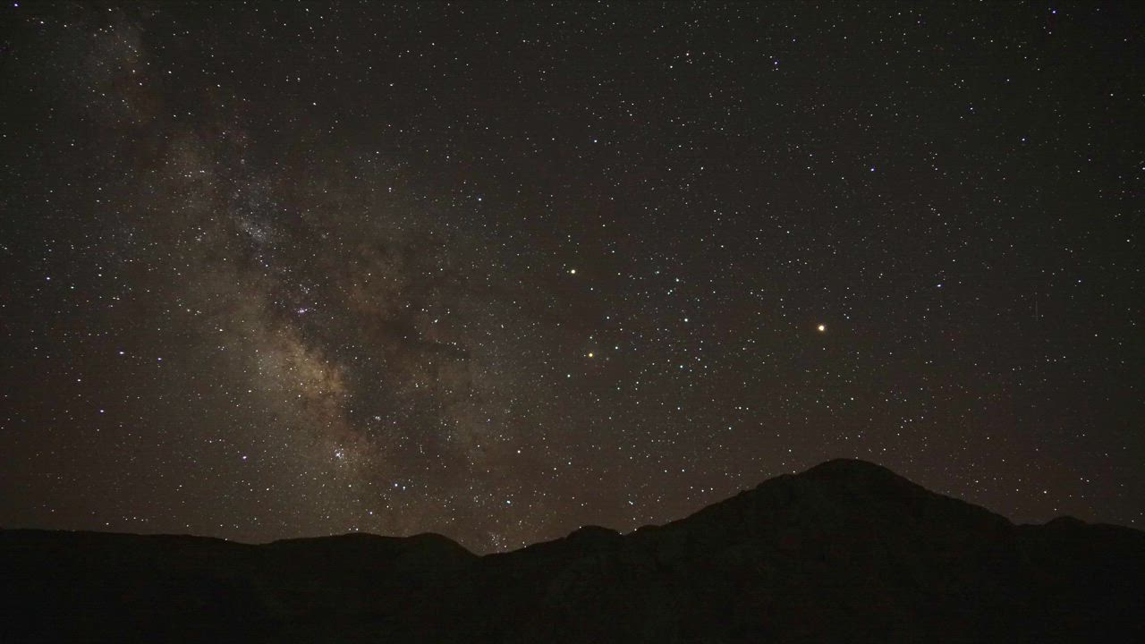 The milky way is moving in the night sky - Free Stock Video