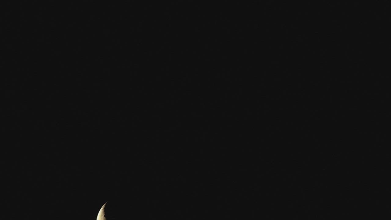 Moon moving in the night sky - Free Stock Video
