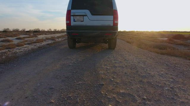 Car going through the countryside road.