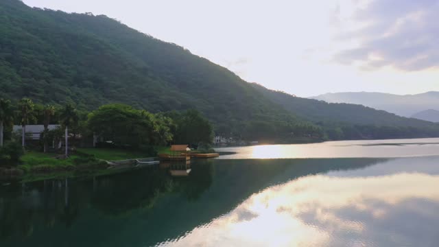 Drone Shot Over Hills and Dock.