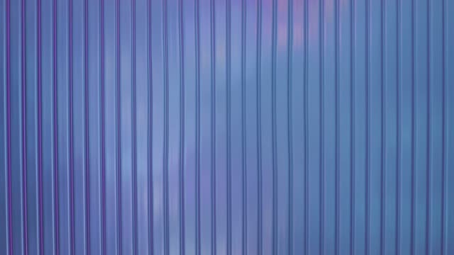 Acrylic Sheet Reflecting Colored Lights.